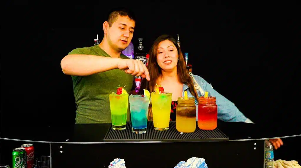 Bartenders making five long iced iced tea drink